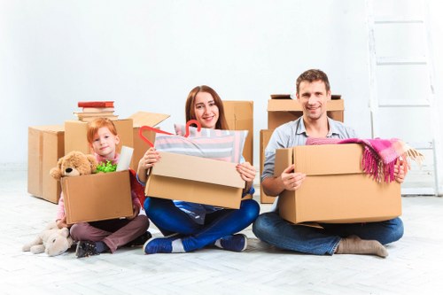 Local moving team handling packing in a Kingsbury property with tight access