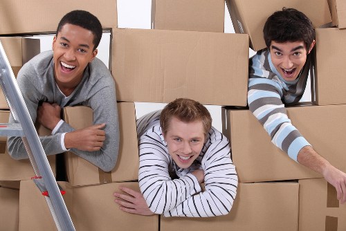 House removals team working in a Kingsbury residential street