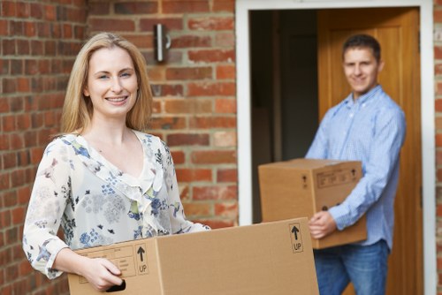 Professional moving team loading furniture in Kingsbury