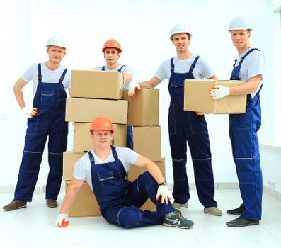 Local moving truck service handling boxes and household items in Kingsbury