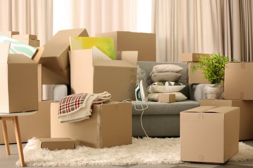 Loading furniture and boxes into a removal truck in Kingsbury