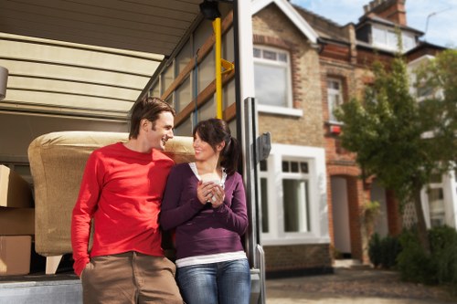 Packed moving boxes and home furniture ready for a Kingsbury house removal