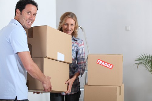 Local removals van loading furniture for a Kingsbury move